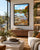 A framed landscape art print depicting a scenic river Dee with rocks, autumn foliage, and a church steeple, displayed on a wall in a modern, sunlit living room with a sofa, coffee table, and plants.